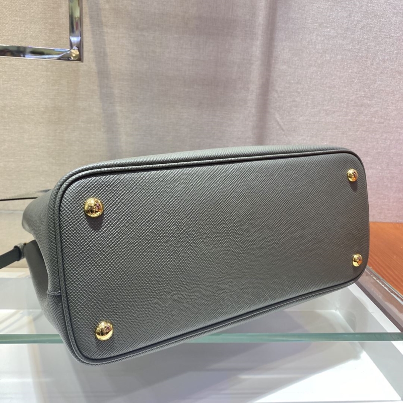 Pra*a top handle bags